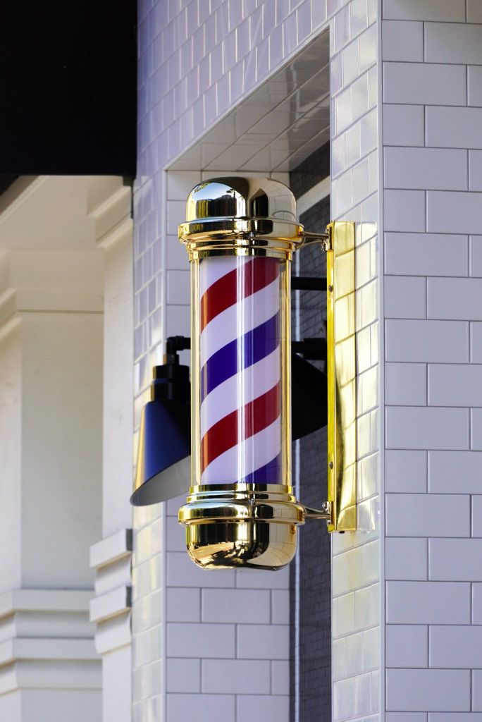 Professional barbers at work in our San Jose barber shop Luxury barbershop interior – Gents Barber Club San Francisco Client receiving haircut at Gents Barber Club, top barbers near me